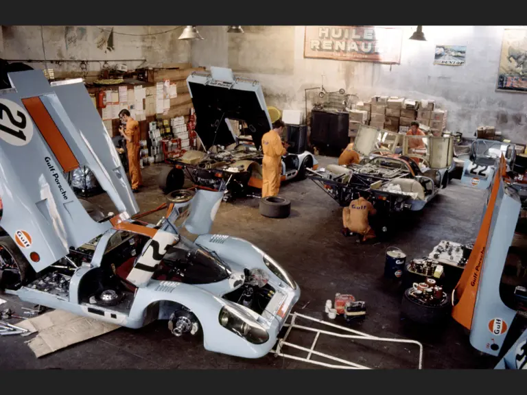 The trio of Gulf-Porsche 917s are dutifully prepared for competition at Le Mans, 1970.