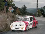 Alain Prost and co-driver Jean-Marc Andrié hurtle around a corner during the 1982 Rallye du Var.