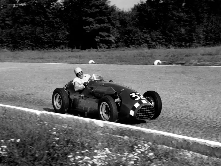 Stirling Moss behind the wheel of the Connaught at the 1952 Italian Grand Prix at Monza.