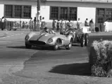 Richie Ginther behind the wheel of chassis no. 0680 MDTR (race #11) leads a Frazer-Nash (race #33) at the Santa Barbara Road Races, 1958.