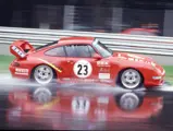 The Porsche races through the rain at Monza in 1998.