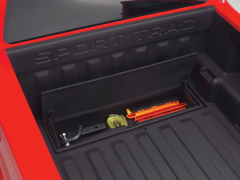 Ford Sport Trac Adrenalin teaser: Adrenalin's composite bed features a storage box (open) integrated into the load floor.