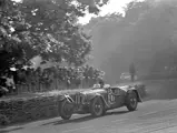 The Jayson-Henry/Rolt Delahaye fielded by Rob Walker darts out of Tetre Rouge at the 1949 24 Hours of Le Mans.