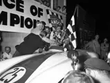 Carroll Shelby and Phil Hill celebrate their perceived victory in the 1955 12 Hours of Sebring before their result was overturned, leaving them in second place overall.