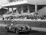 Dashing down the home straight at the 1949 24 Hours of Le Mans.