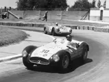 The Maserati in the colors of "Equipo Presidente Peron" en route to 3rd overall at the 1955 Buenos Aires 1000 KM.