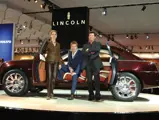 Gerry McGovern (R), Design Director, Lincoln Mercury, Marek Reithman, (C), Navicross Chief Designer, Adriana Monk, (L), Design Manager, Interior-Navicross, are pictured here with the Lincoln Navicross Concept.  The Lincoln Navicross was revealed to the press at the North American International Auto Show in Detroit, January 6, 2003.