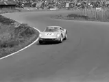 Seen here manoeuvring through the twists and turns of the Nürburgring, Udo Schütz and Anton Fischhaber drove chassis 036 to finish 11th overall and 1st in the GT class at the Nürburgring 1000 Kilometres on 23 May 1965.