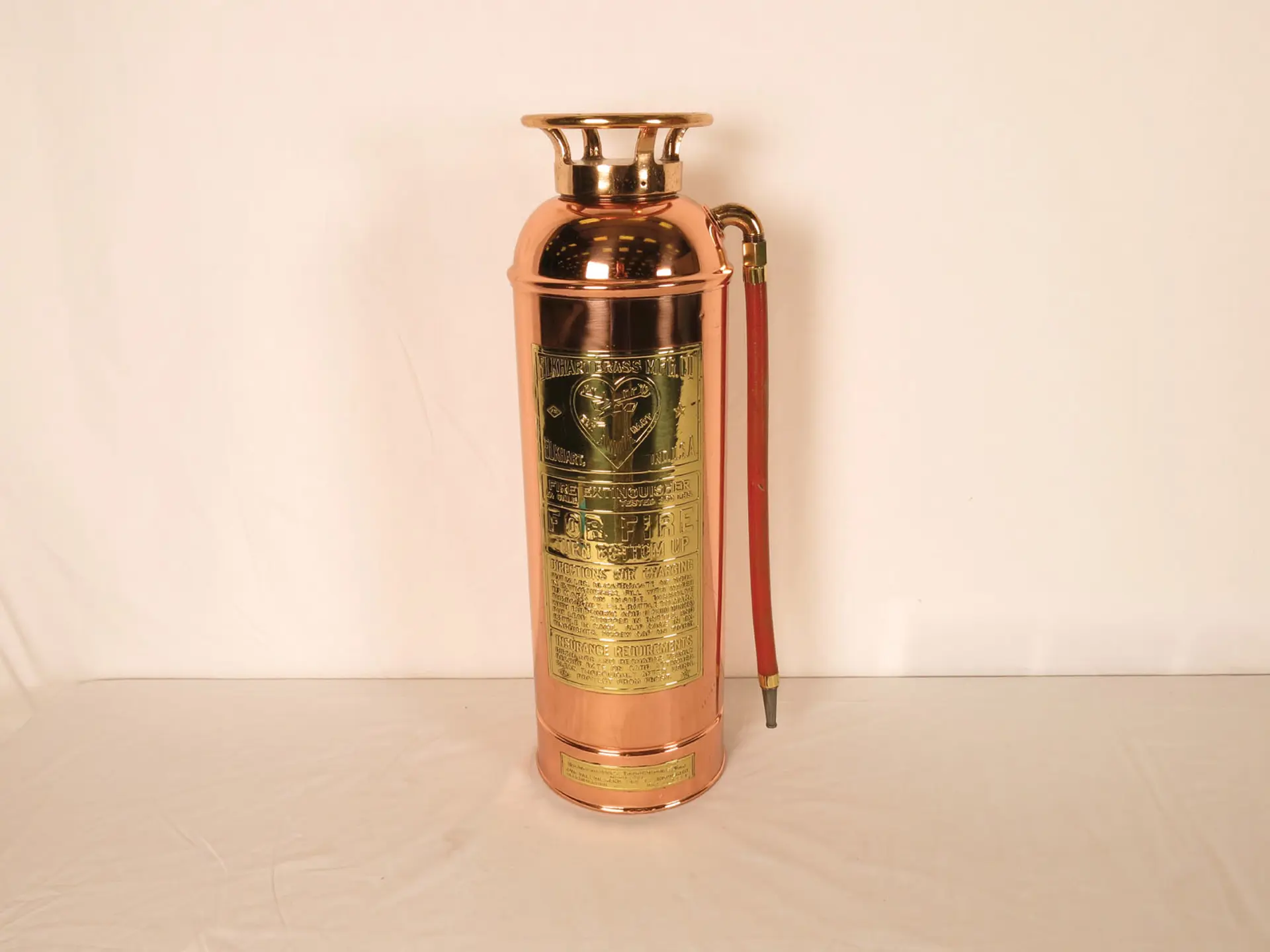 Brass Elkhart mfg. co. extinguisher | Auburn Spring 2013 | RM Sotheby's