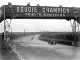 Chassis 1711 racing under the famous bridge at Le Mans in 1935.