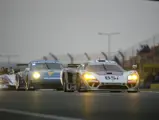 The Labre Competition Saleen S7-R is followed by a Porsche 911 GT3 RS and WR LMP 2008 during the 2010 24 Hours of Le Mans.