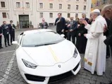 His Holiness Pope Francis signs the Lamborghini Huracán at a ceremony in Vatican City in November of 2017.