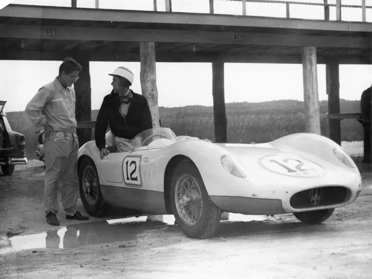 Masten Gregory talks to the legendary John Fitch in chassis 2427 at Nassau Speed Week, circa 1957.