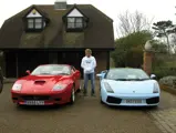 Rod Stewart poses with his Ferrari 575 Superamerica and Lamborghini Gallardo Spyder outside his home in 2009.
