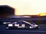 The XJR-12 is driven into dusk at the 1991 24 Hours of Le Mans.