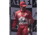 Michael Scumacher just edged out Ferrari teammate Rubens Barrichello to win the 2002 Austrian Grand Prix.