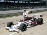 Johnny Rutherford competes at the 1979 Indianapolis 500 in his #4 McLaren M24B.