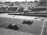 0312901, #2, races to the finish line against SF28 at Kyalami, ca. 1960s.