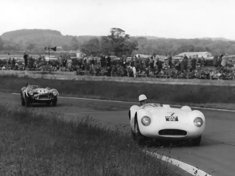 Michael Head, driving HOT 95, bests Peter Blond in the Aston Martin DB3S at Goodwood in June 1957.