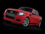 Ford Sport Trac Adrenalin teaser: Adrenalin's performance is communicated through its aggressive black chrome grille and SVT Red paint.