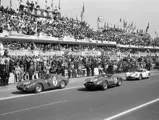 CIRCUIT DE LA SARTHE, FRANCE - JUNE 24: Mike Parkes / Lorenzo Bandini, SpA Ferrari SEFAC, Ferrari 330 LM/GTO, Olivier Gendebien / Phil Hill, SpA Ferrari SEFAC, Ferrari 330 TRI/LM (Spyder), and Bruce McLaren / Walt Hansgen, Briggs Cunningham, Maserati Tipo 151/1 Coupé, pull away at the start during the 24 Hours of Le Mans at Circuit de la Sarthe on June 24, 1962 in Circuit de la Sarthe, France. (Photo by LAT Images)