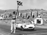 Merle Brennan takes the checkered flag at Laguna Seca, June 9, 1963.