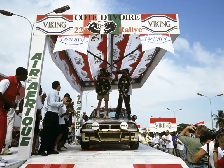 Patrick Tauziac and Claude Papin celebrate their victory at the 1990 Rallye Côte d’Ivoire Bandama.