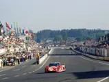 The Ferrari 512 BB/LM of Scuderia Bellancauto races past the pit lanes at the 1984 24 Hours of Le Mans.