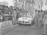 The Alfa Romeo Giulietta Spider, driven by Mario Tropia and Giuseppe Parla, at the 1961 Targa Florio.