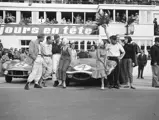 Chassis no. XKD 501 pictured at the finish of the 1956 24 Hours of Le Mans along with the 2nd place Aston Martin DB3S of Sir Stirling Moss and Peter Collins.