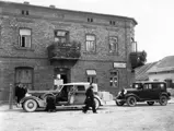 Parked on street in front of restaurant in Kozieglowy, Poland - August 12, 1934.