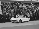 Cunningham fires up the #1 Corvette as Alfred Momo and the paddock crowd cheer him on.