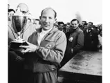 Moss posses for the camera having been awarded the 1st-Place Daily Express Trophy in 1961.