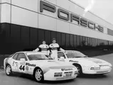 Tiff Needell and Tony Dron pose with a 944 Turbo and the 928 in early 1988.