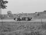 Phil Hill at the wheel of XKC 007 en route to victory at Elkhart Lake in September of 1952, the first race win for a C-Type in the United States.
