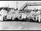 The victorious NSKK team with their cars after the 1939 24 Hours of Le Mans race. From left to right: Hans Wencher, Ralph Roese, Paul Heinemann, Willi Briem, and Rudolf Scholz.