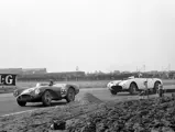 Peter Collins leads in DB3S/2 at Aintree, ahead of Masten Gregory in his Ferrari 375MM.