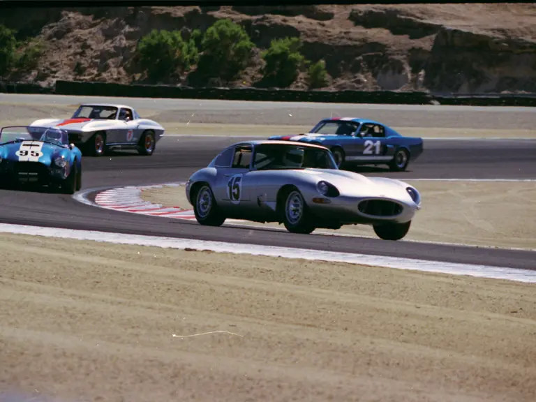 Charlie Hayes in CSX 2557 chases an E-Type into the corners at the season-ending FIA race at Bridgehampton in ‘64, with a Corvette and GT350 hot on his tail.