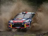 Sébastien Loeb and Daniel Elena make a splash at the 2012 Acropolis Rally, a race in which they finished in 1st place.