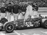 Denny Hulme and his crew pose with chassis no. 704 prior to the 1969 Indianapolis 500.