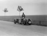 Eddie Hall takes pause with chassis K3016 at the side of the road (date unknown).