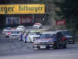 Bernd Schneider’s 190 E 2.5-16 Evolution II is captured at the forefront of the grid at Zolder on 5 April 1992, contesting the DTM series.