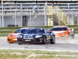Chassis 119529 races in Round 4 of the Coppa Ferrari Challenge at the Imola Circuit on 9 July 2000.