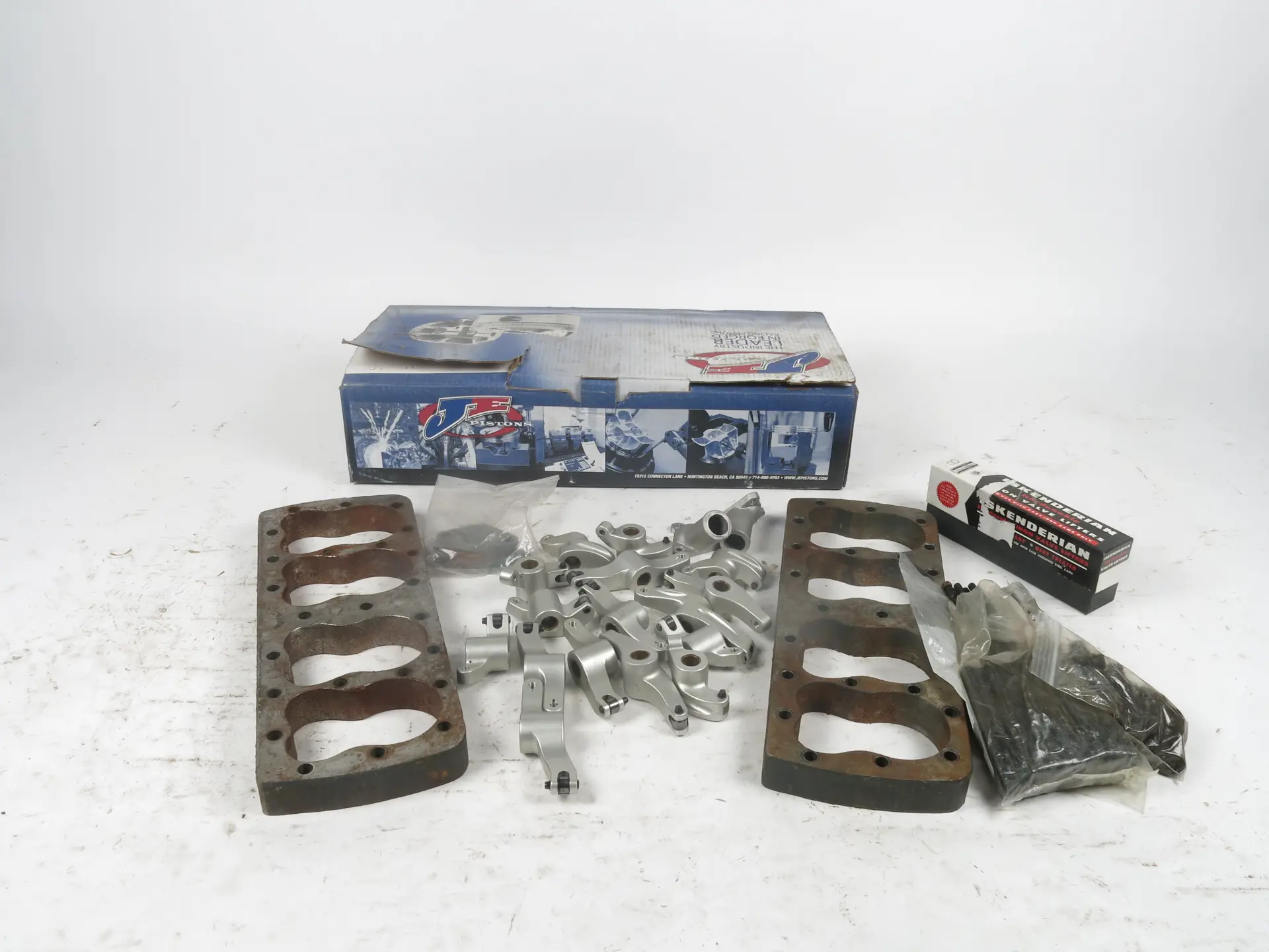 Ardun rocker arms, Flathead leak down test plates, JE pistons and