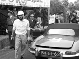 Pinto as shown in the pits next to his E-Type at Montes-Claros in 1963.