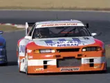 1 October, 1994: In his desperate bid for the championship, Masahiro Hasemi takes his #3 UNISIA-JECS Skyline wheel to wheel against his closest rival, the #1 Calsonic/Hoshino Racing Skyline of Masahiko Kageyama at Mine Circuit during the final round of the 1994 JGTCC-GT1 season.
