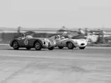  XKC 007 and Carlyle Blackwell go nose-to-nose with Pete Woods and his D-Type at Santa Barbara.