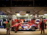 The F430 GT2 in the pits at night during the 2009 24 Hours of Le Mans.