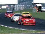 The Porsche is seen here racing at Imola in 1997.