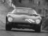 Chassis number 3413 GT at speed at Brands Hatch with David Piper in December 1965.